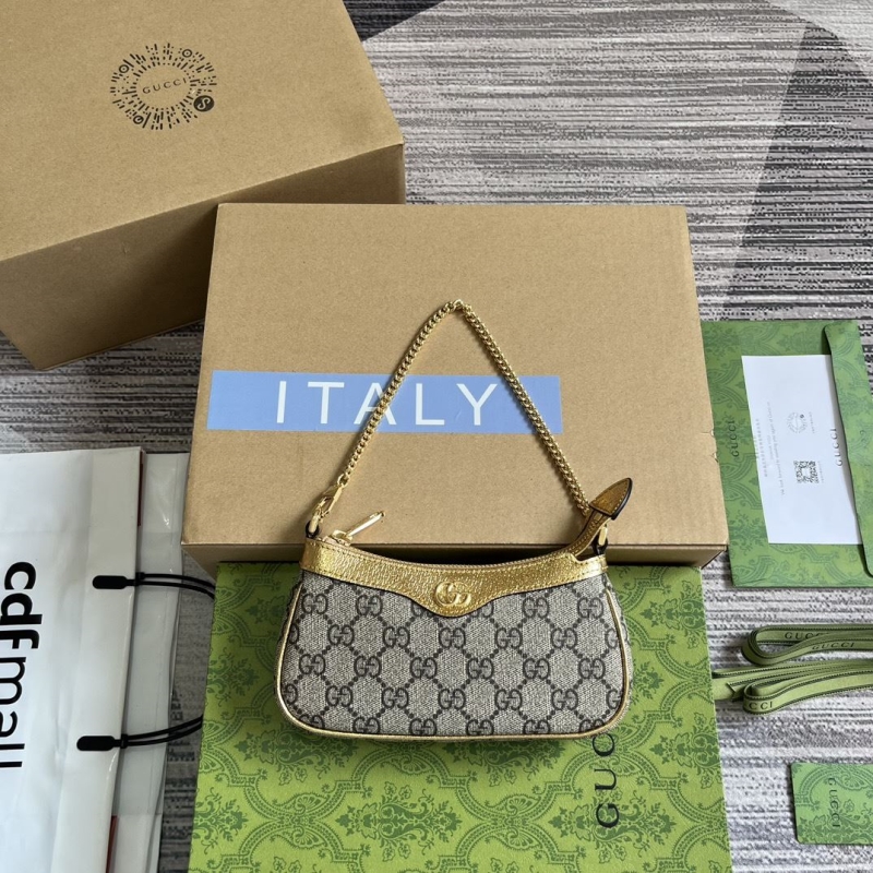 G*u*i top handle bags